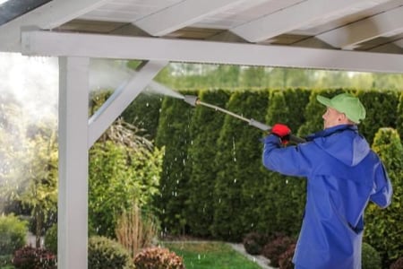 a technician cleaning a home