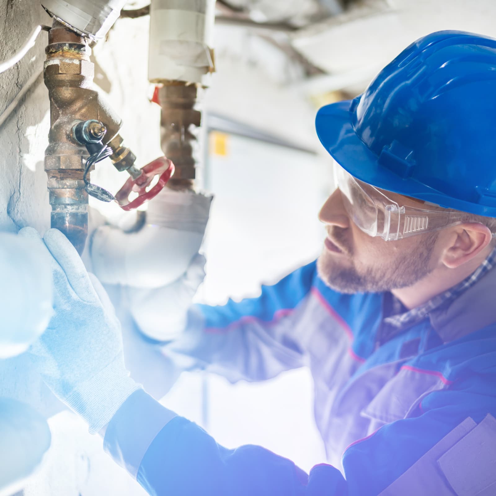 Skilled trade plumber inspecting pipes